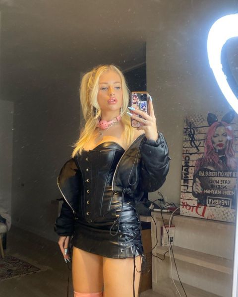 Lottie flaunting her incredible figure in a mirror selfie for her fans.